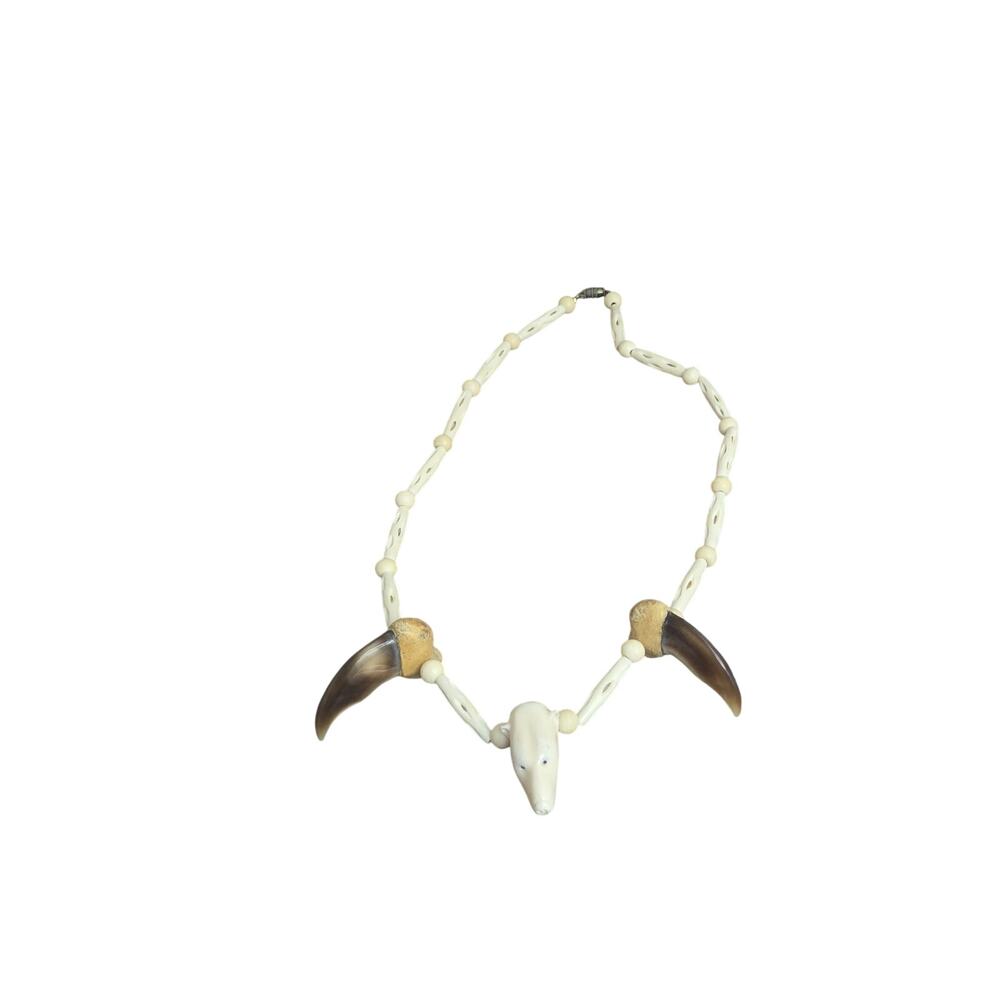 Carved bear bone and real claw artisan necklace